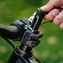 OneUp Components EDC Threadless Carrier Black -Cycling Pro Shop OneUp Components EDC Threadless Carrier Oil Slick On Bike Tool Being Removed 966 2